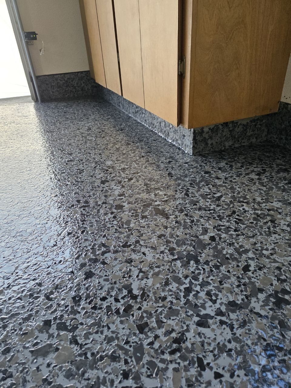Dark charcoal epoxy flake garage floor installed by 360 Surfaces, Vancouver WA