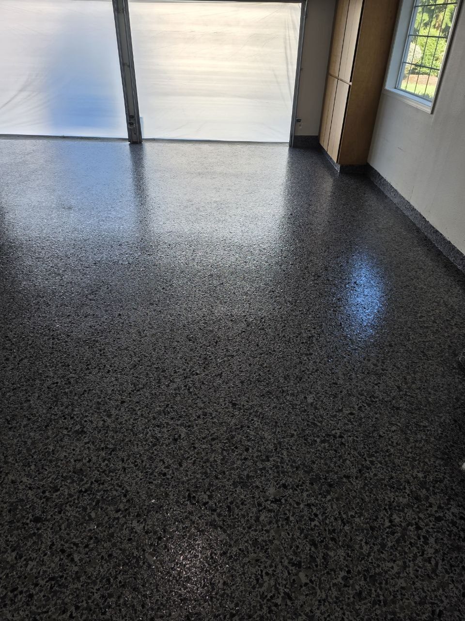 Dark charcoal epoxy flake garage floor installed by 360 Surfaces, Vancouver WA