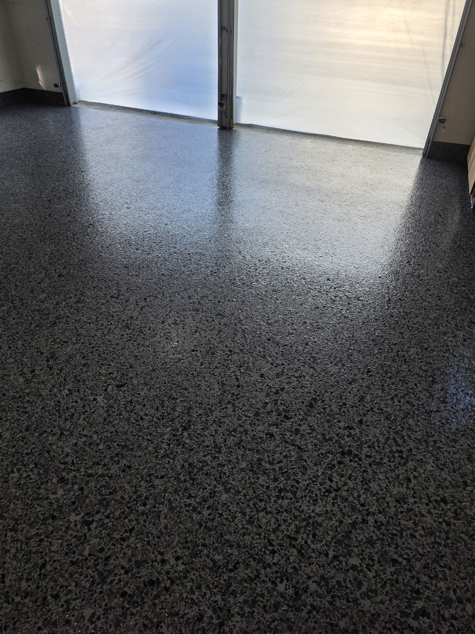 Dark charcoal epoxy flake garage floor installed by 360 Surfaces, Vancouver WA
