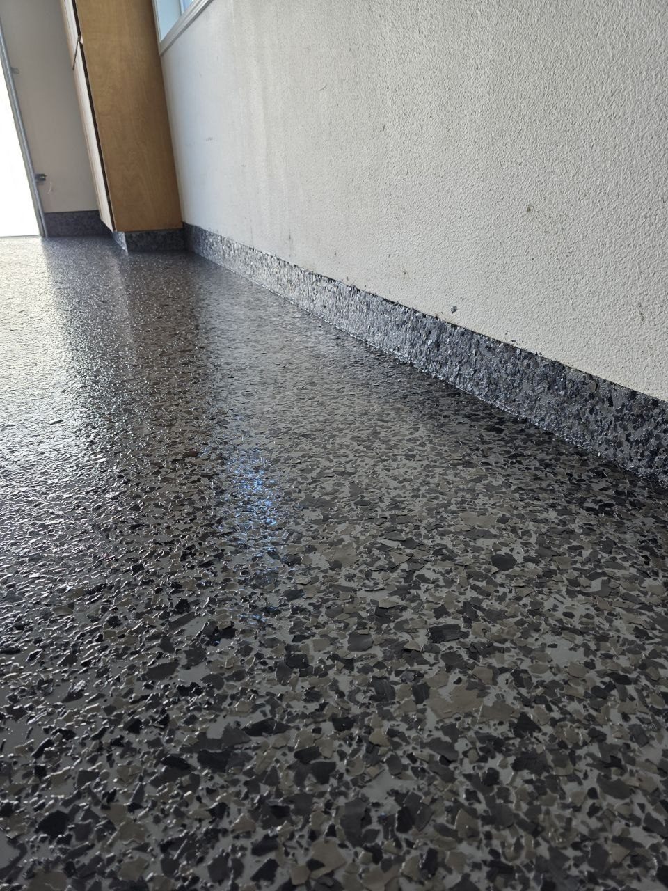 Dark charcoal epoxy flake garage floor installed by 360 Surfaces, Vancouver WA