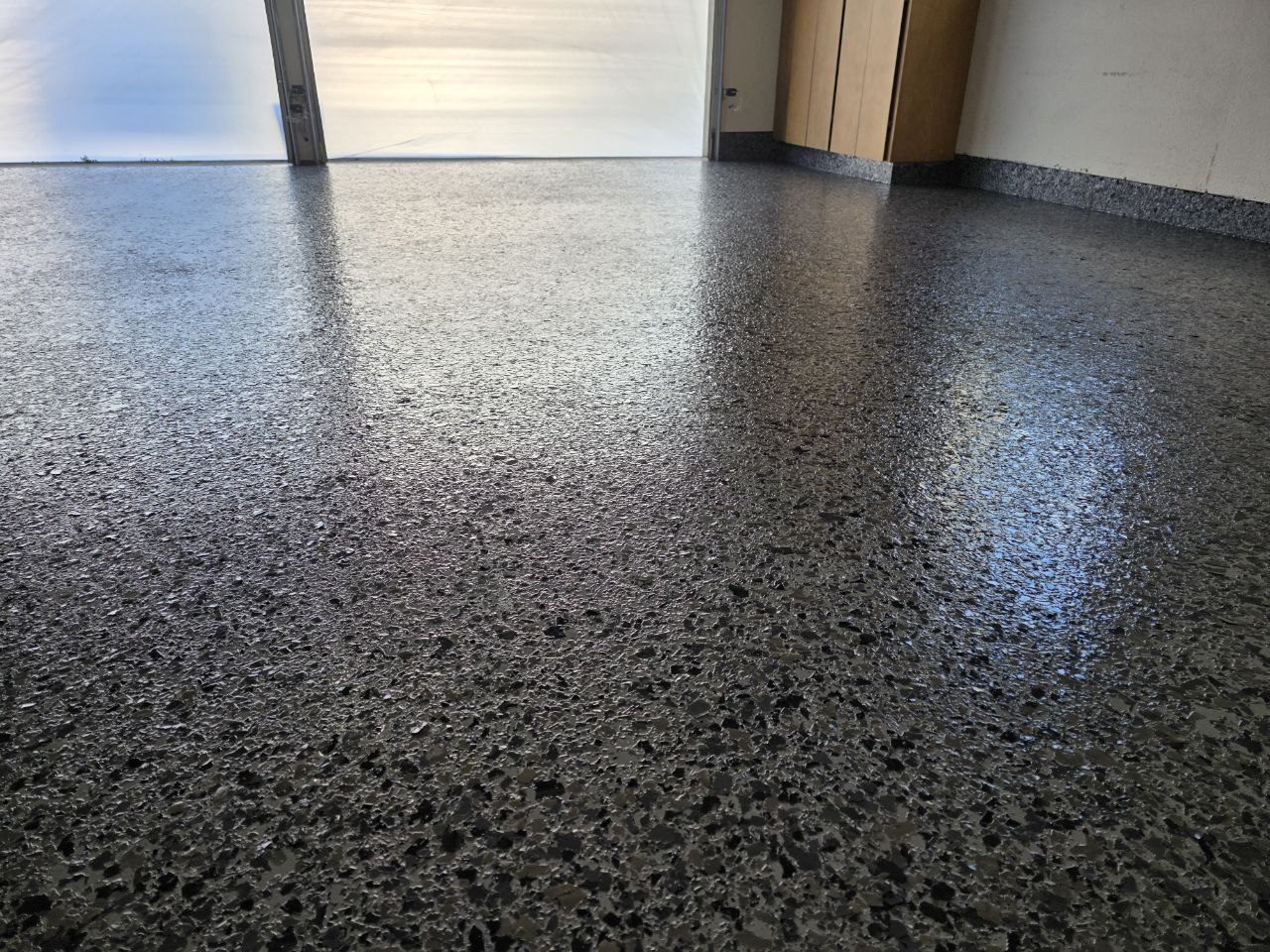Dark charcoal epoxy flake garage floor installed by 360 Surfaces, Vancouver WA