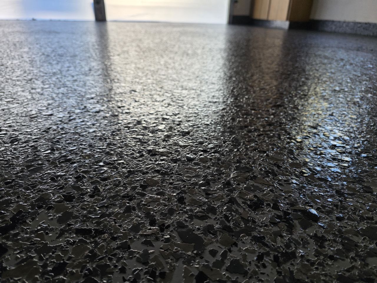 Dark charcoal epoxy flake garage floor installed by 360 Surfaces, Vancouver WA