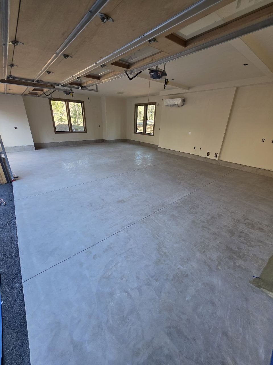 Bare concrete garage slab before epoxy flake coating — 360 Surfaces Vancouver WA